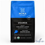 Front of MOKA Origins Uganda organic dark roast whole bean coffee bag