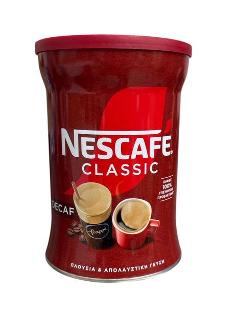 Red Nescafe Classic coffee can on a white background