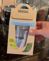 NESCAFÉ Frappé silver-toned cup with lid in branded cardboard carry packaging