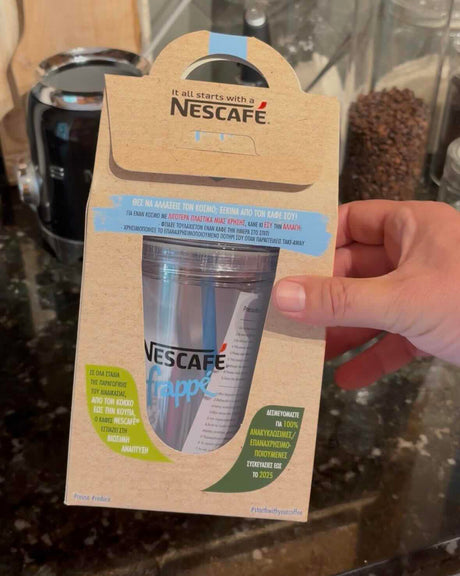 NESCAFÉ Frappé silver-toned cup with lid in branded cardboard carry packaging
