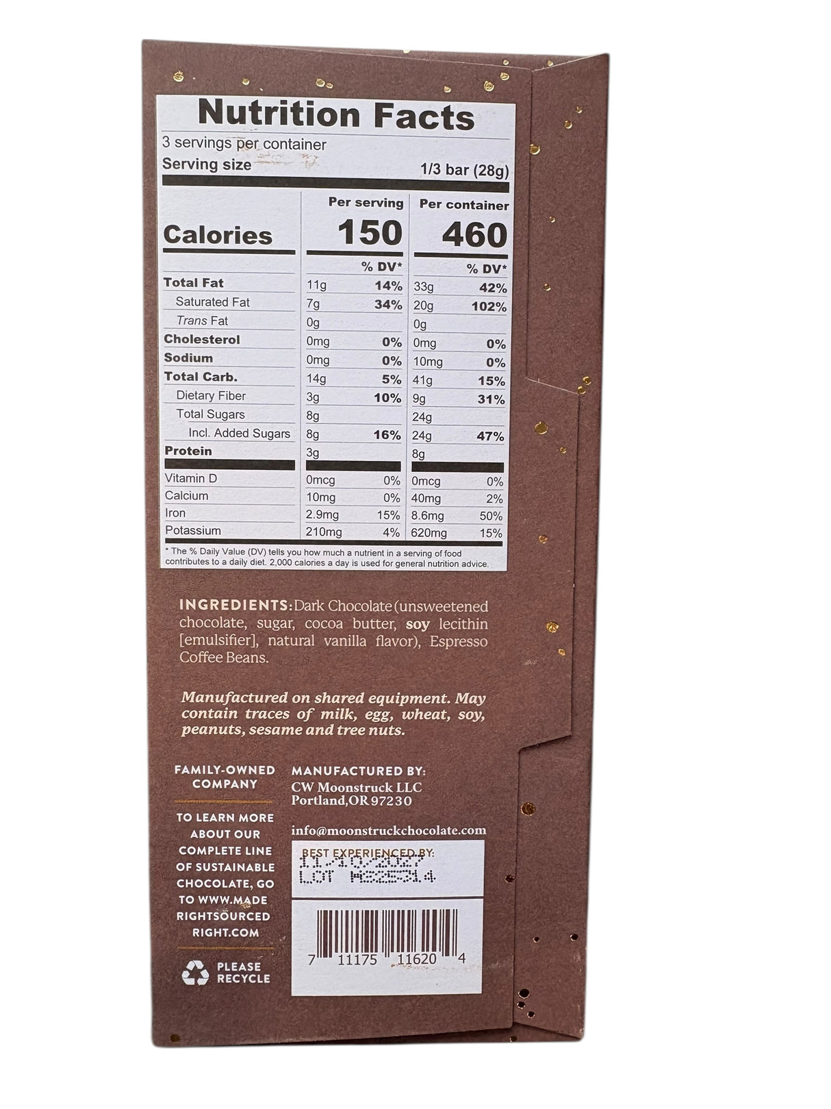 Nutrition facts label on a chocolate bar packaging with ingredients listed.