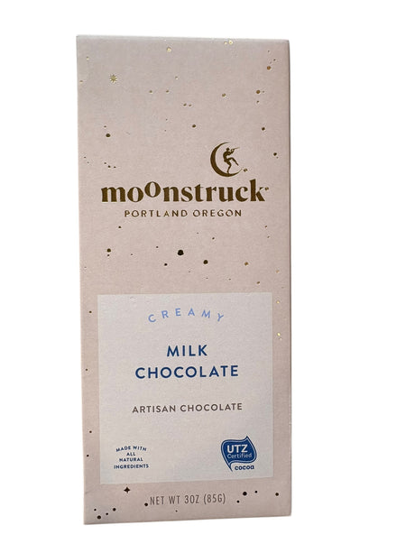 Moonstruck creamy milk chocolate bar packaging on a white background