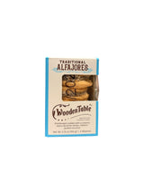 WoodenTable Traditional Alfajores box styled on kitchen counter with mug and plants