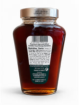 Back of Attiki Dark Brown Forest Honey jar showing nutrition facts and Product of Greece label